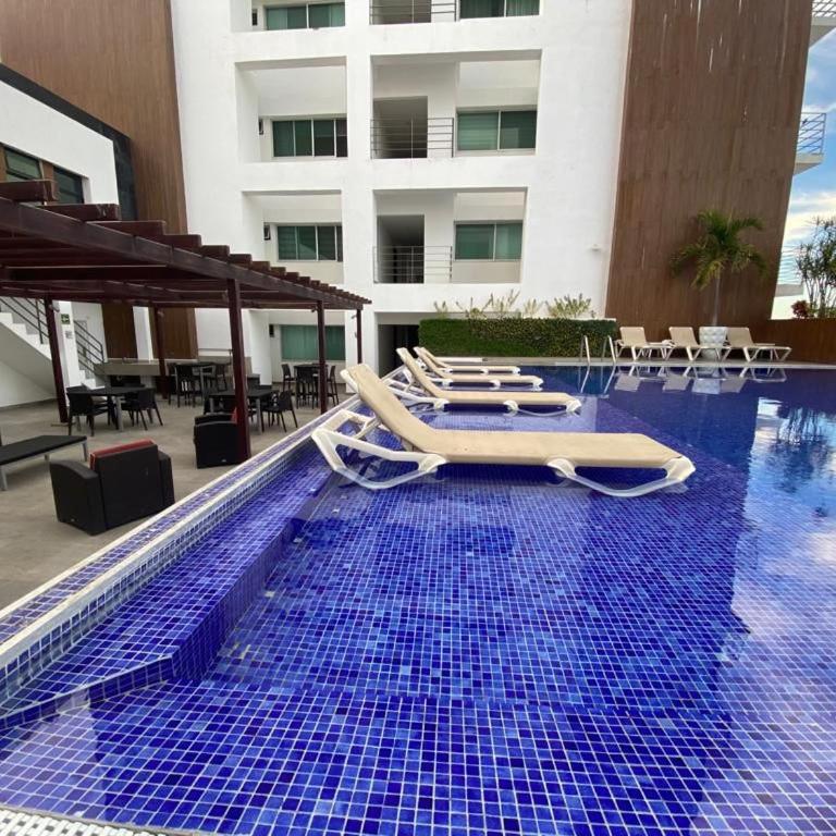 Comodo, espacioso, alberca, asador y amenidades - Apartamento de 2 dormitorios - 29