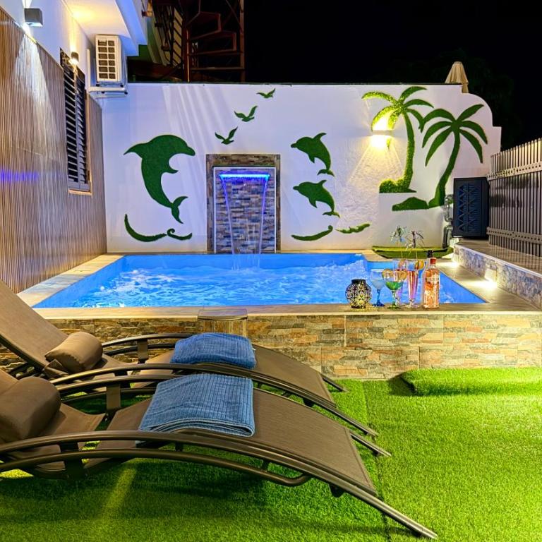 Villas Puerto Rico in front of the shopping center with private heated saltwater pool with jacuzzi function & arcade games - Villa Estándar - 5
