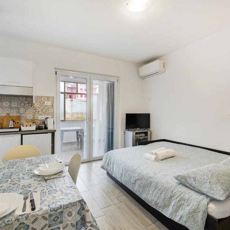 Il Gattino di Porto 1 - veranda - Appartamento con 1 Camera da Letto e Vista Giardino - 2