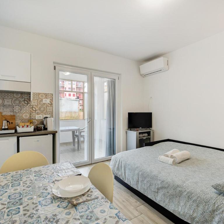 Il Gattino di Porto 1 - veranda - Appartamento con 1 Camera da Letto e Vista Giardino - 5
