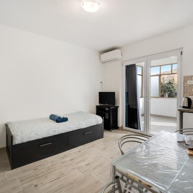 Il Gattino di Porto 3 - veranda - Appartamento con 1 Camera da Letto e Vista Giardino - 4