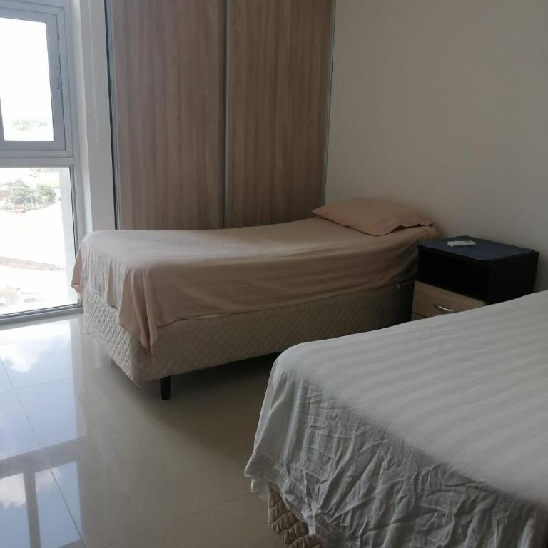 Retiro Urbano Familiar, Comodidad y Estilo - Three-Bedroom Apartment - 3