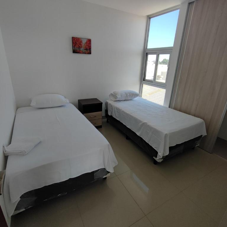 Retiro Urbano Familiar, Comodidad y Estilo - Three-Bedroom Apartment - 3