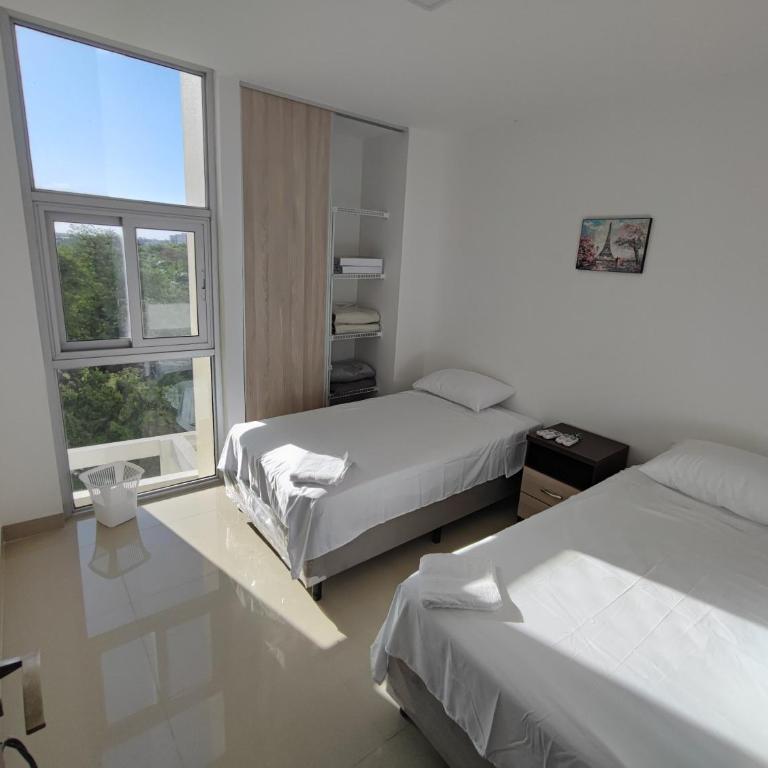 Retiro Urbano Familiar, Comodidad y Estilo - Three-Bedroom Apartment - 4