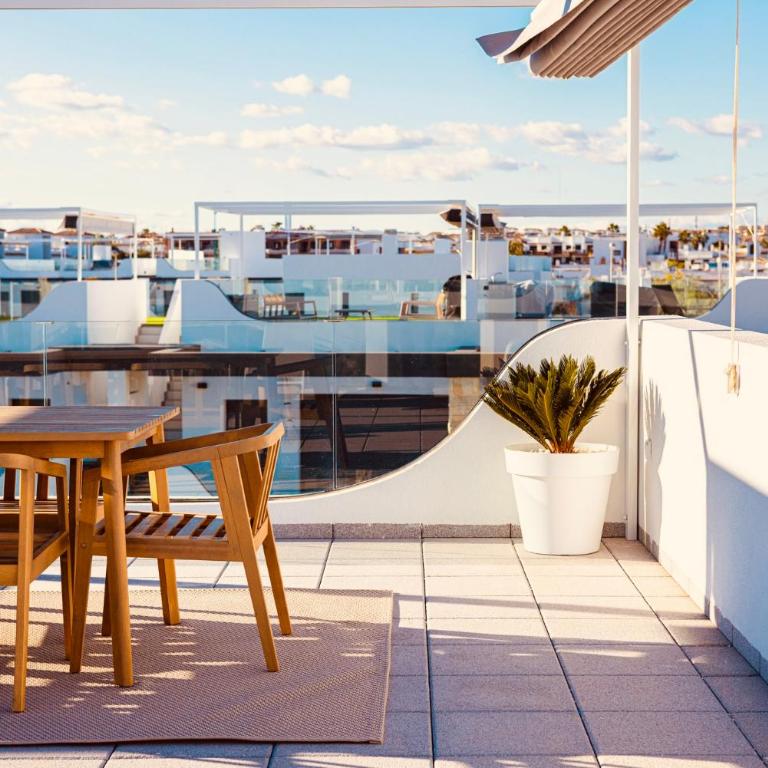 Luxe Penthouse met Dakterras en Zeezicht - Three-Bedroom House - 58