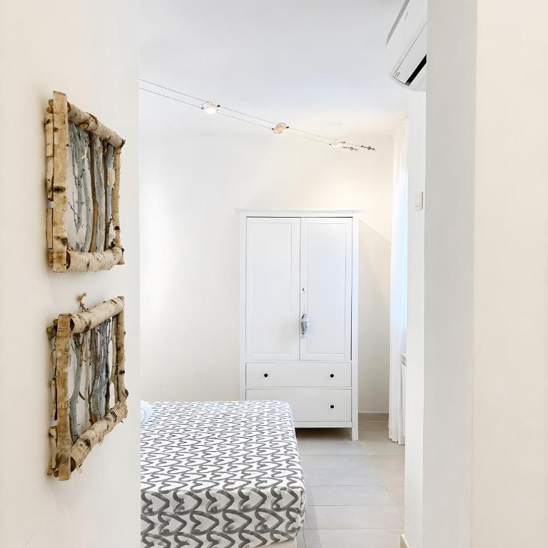 C 102 Puntavilla Mare - Appartamento Deluxe con 2 Camere da Letto e Vista Giardino - 13