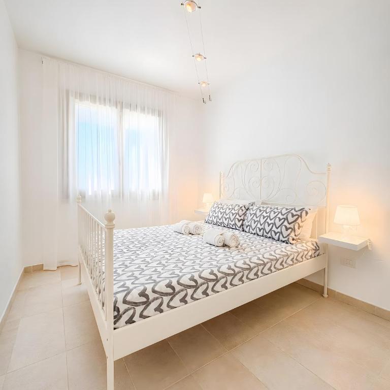 C 102 Puntavilla Mare - Appartamento Deluxe con 2 Camere da Letto e Vista Giardino - 10