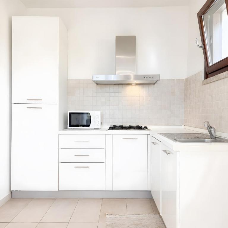 C 102 Puntavilla Mare - Appartamento Deluxe con 2 Camere da Letto e Vista Giardino - 4
