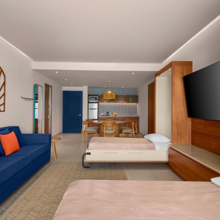 Hilton Cancun Mar Caribe All-Inclusive Resort - Suite Enclave frente a la playa - 1 cama extragrande y 2 camas Murphy - 4