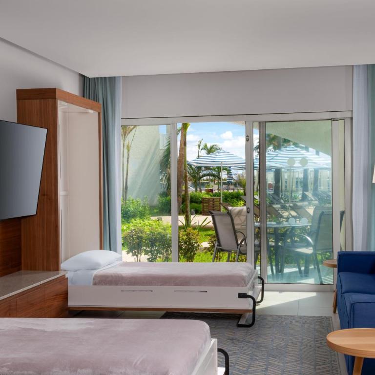 Hilton Cancun Mar Caribe All-Inclusive Resort - Suite con vistas al resort - 1 cama extragrande y 2 camas plegables - Enclave - 3