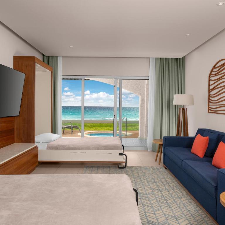 Hilton Cancun Mar Caribe All-Inclusive Resort - Habitación Enclave frente a la playa - 2 camas extragrandes Murphy - 6