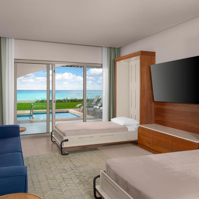 Hilton Cancun Mar Caribe All-Inclusive Resort - Habitación Enclave frente a la playa - 2 camas extragrandes Murphy - 5