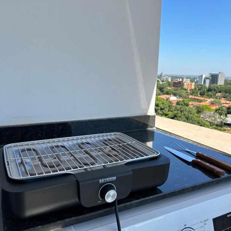 City Skyline Haven with Workspace Pool and Gym - Apartamento - 31