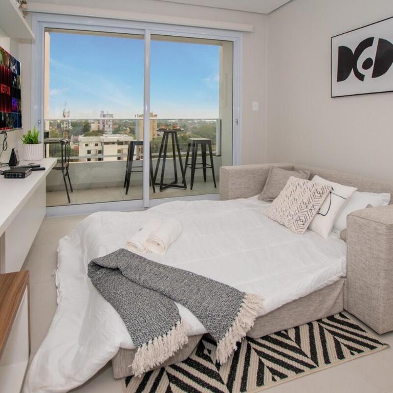 Vibrant Stay with Rooftop BBQ Pool and Near Malls - Apartamento - 31