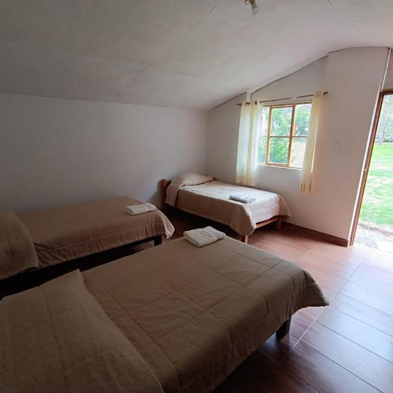Tropical Lodge - Triple Room with Private Bathroom - 2