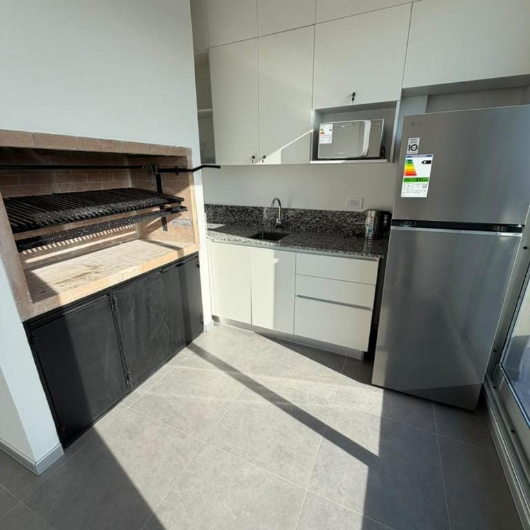 Nuevo 2 amb piso 13, Vistas y amenities - Cerca San Telmo y Puerto Mad - Apartamento de 1 Dormitorio con balcón y vistas a la ciudad - 11