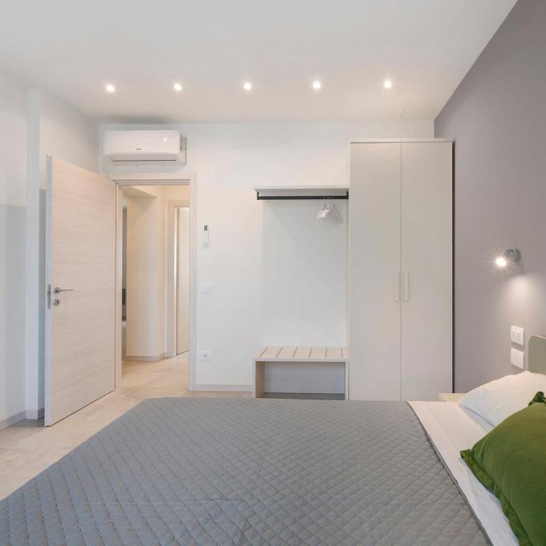 Appartamenti Nonno Lino - Appartamento Deluxe con 2 Camere da Letto e Vista Giardino - 12