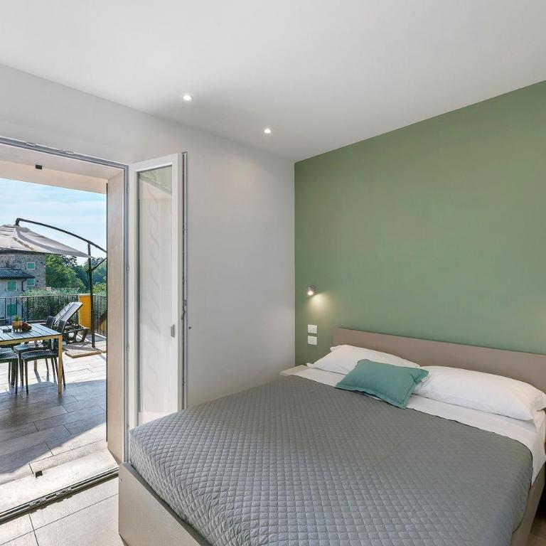 Appartamenti Nonno Lino - Appartamento Deluxe con 2 Camere da Letto e Vista Giardino - 10