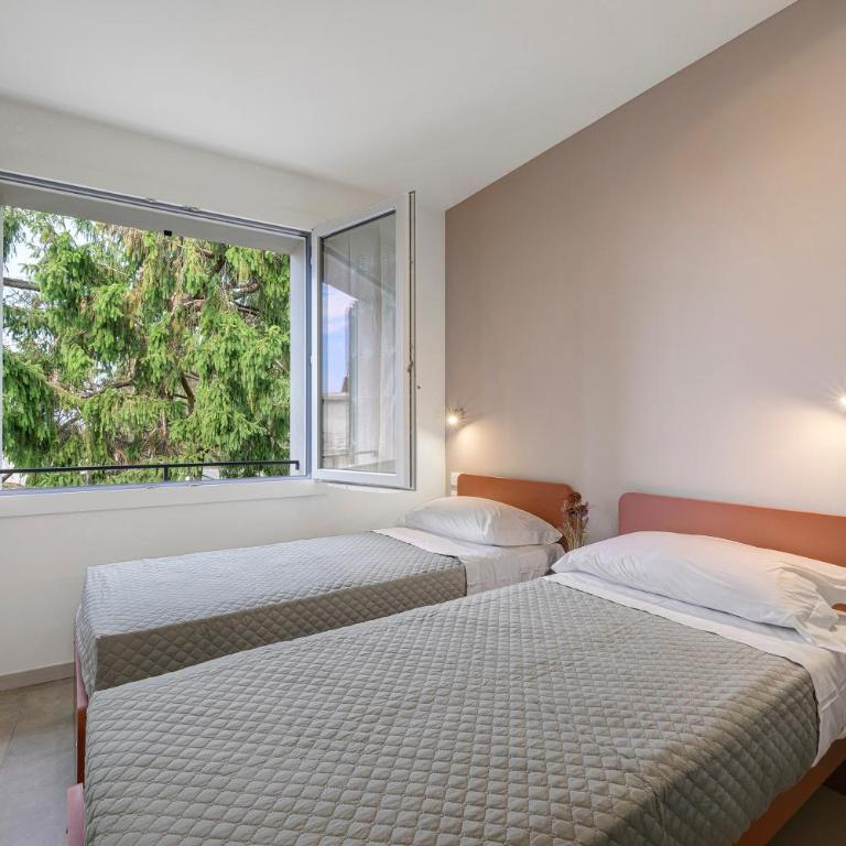 Appartamenti Nonno Lino - Appartamento Deluxe con 2 Camere da Letto e Vista Giardino - 20