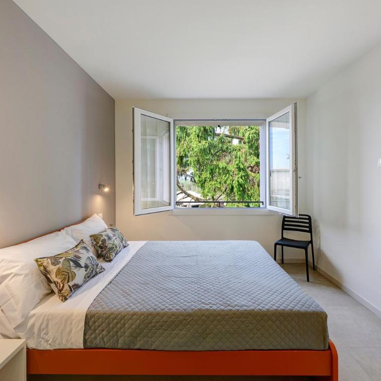 Appartamenti Nonno Lino - Appartamento Deluxe con 2 Camere da Letto e Vista Giardino - 12