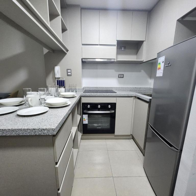 Descanso y comodidad a pasos del Estadio Nacional - One-Bedroom Apartment - 9
