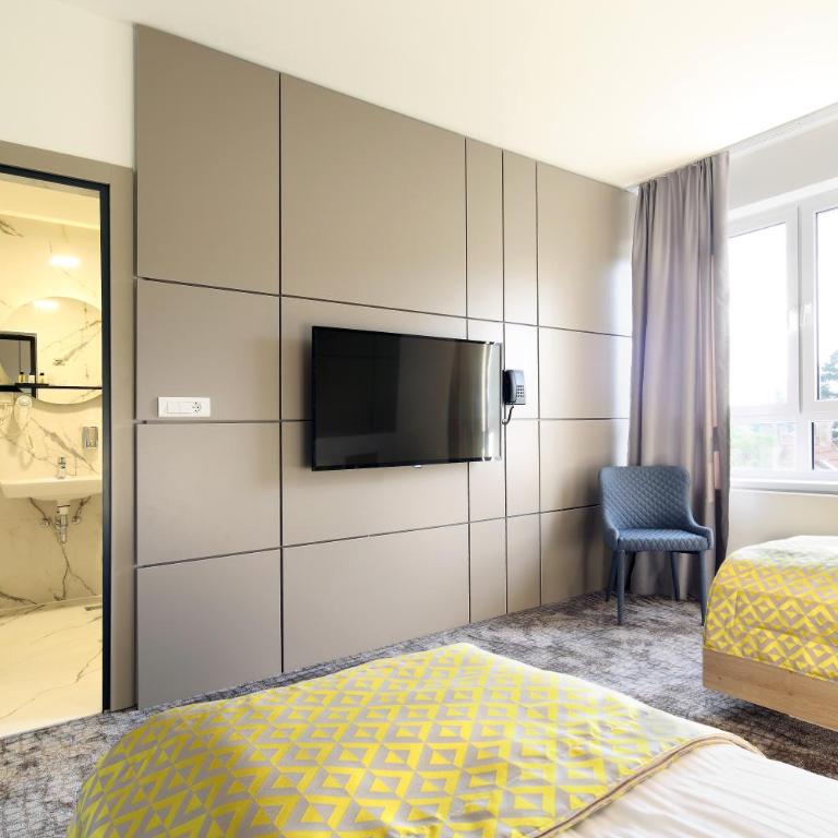 Hotel Koncept Residence - Dreibettzimmer - 5