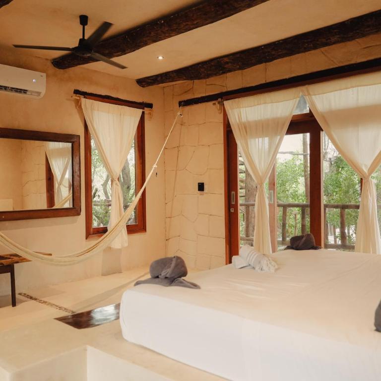 Suites Holbox - Suite mit Terrasse - 13