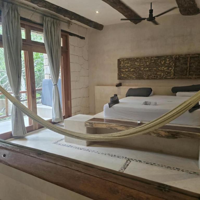 Suites Holbox - Suite mit Gartenblick - 11