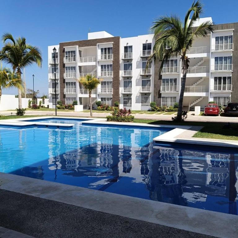 Departamento en Acapulco Con Alberca y Club de Playa Planta Baja - Three-Bedroom Apartment - 18