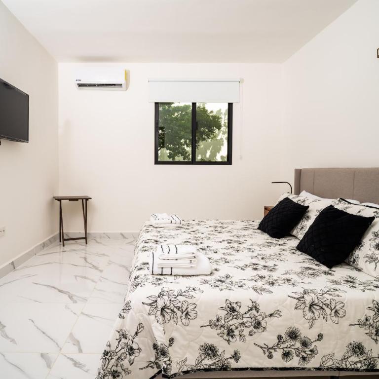 Ombu apartamentos con alberca, seguridad 24h, Wifi - Two-Bedroom Deluxe Apartment with Balcony - 8