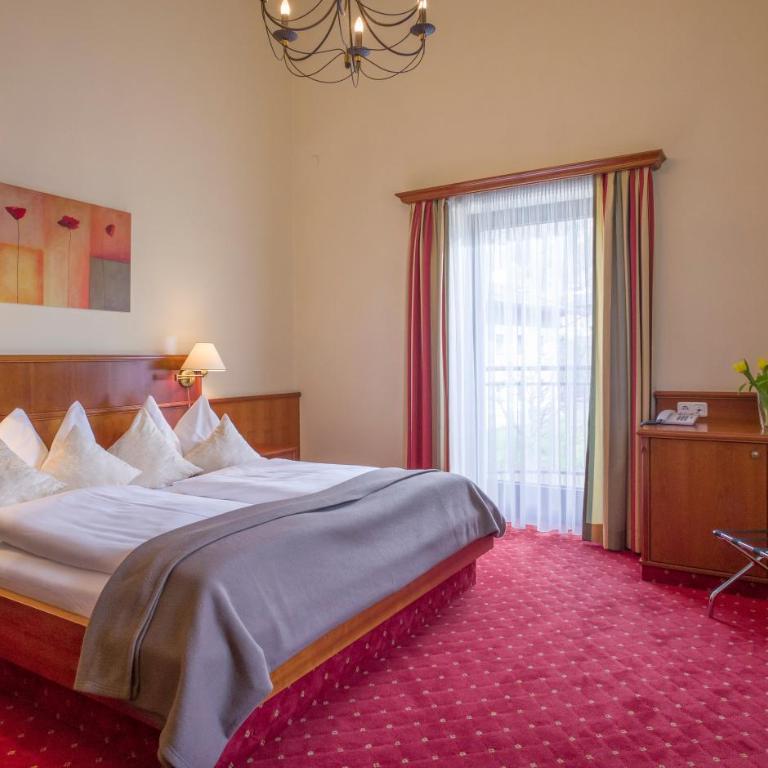 Vital & Sporthotel Brixen - Suite mit Kingsize-Bett und Balkon - 6