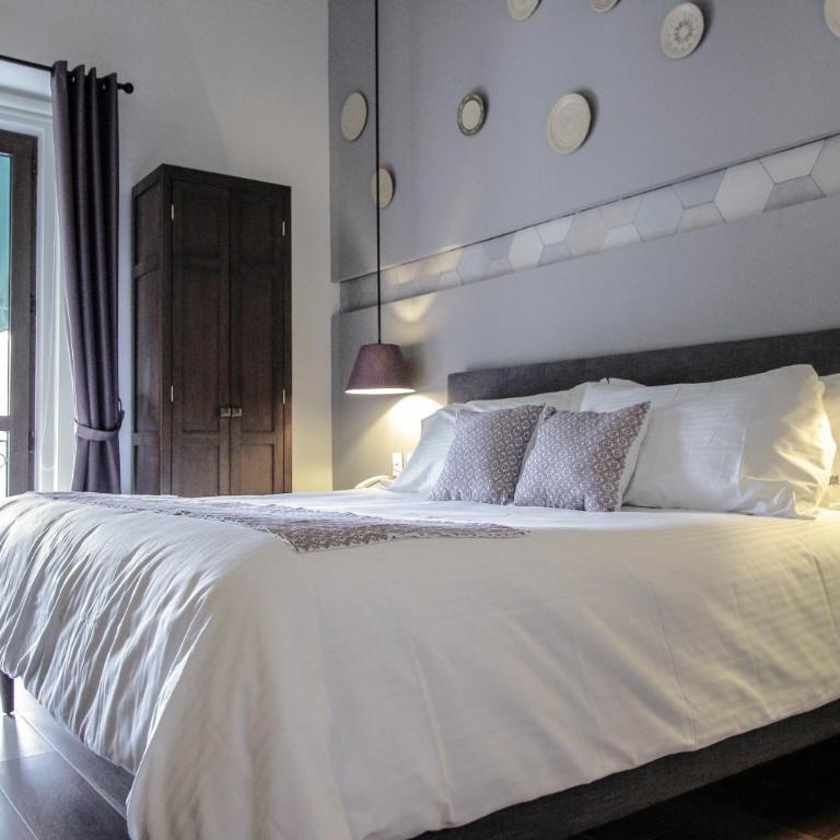 Casa Rosa Gran Hotel Boutique - Suite con cama extragrande y vistas - 8