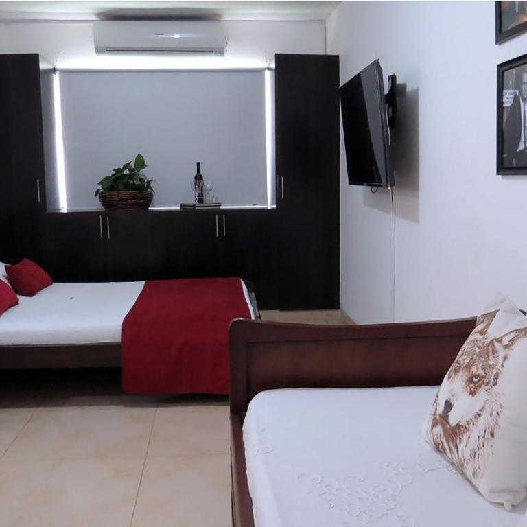 Arco Apartasuites - Estudio con sofá cama - 2