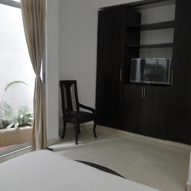 Arco Apartasuites - Estudio con sofá cama - 3