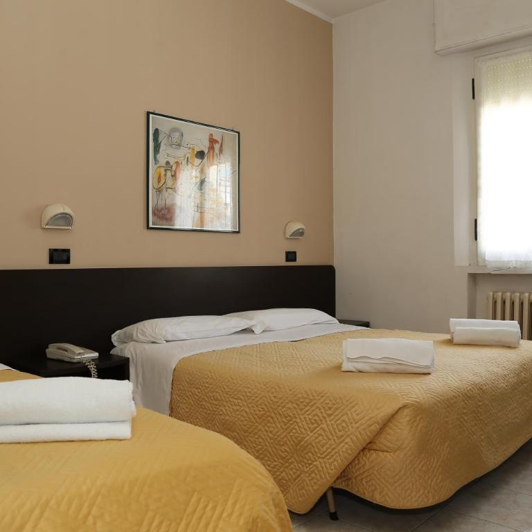 Hotel Villa Dina - Camera Tripla Standard - 1