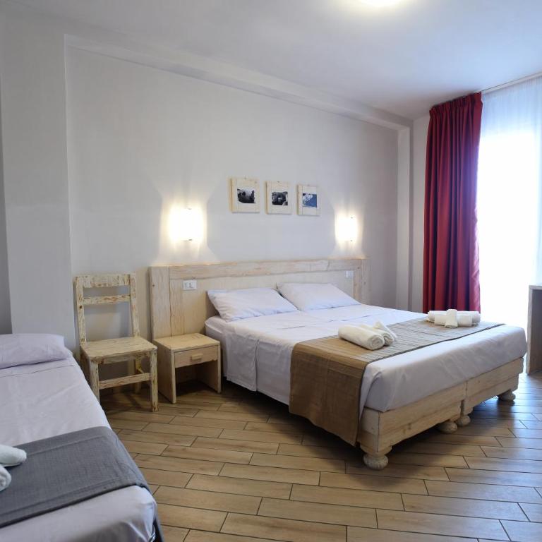 Camere Le Vie di Omero - Camera Tripla Standard - 9