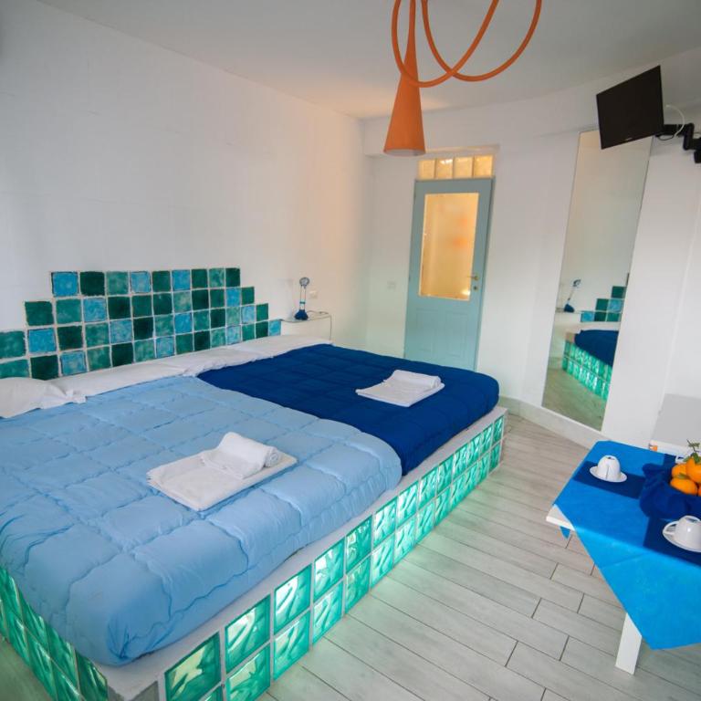 Suite House L'Isola Che Non C'è - Junior Suite con Vista Giardino - 10