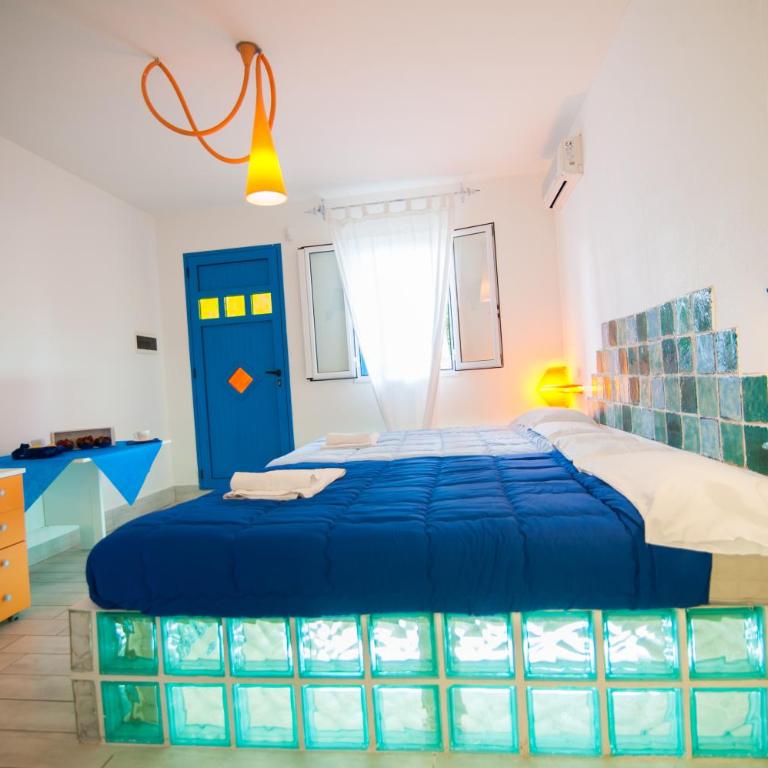 Suite House L'Isola Che Non C'è - Junior Suite con Vista Giardino - 12
