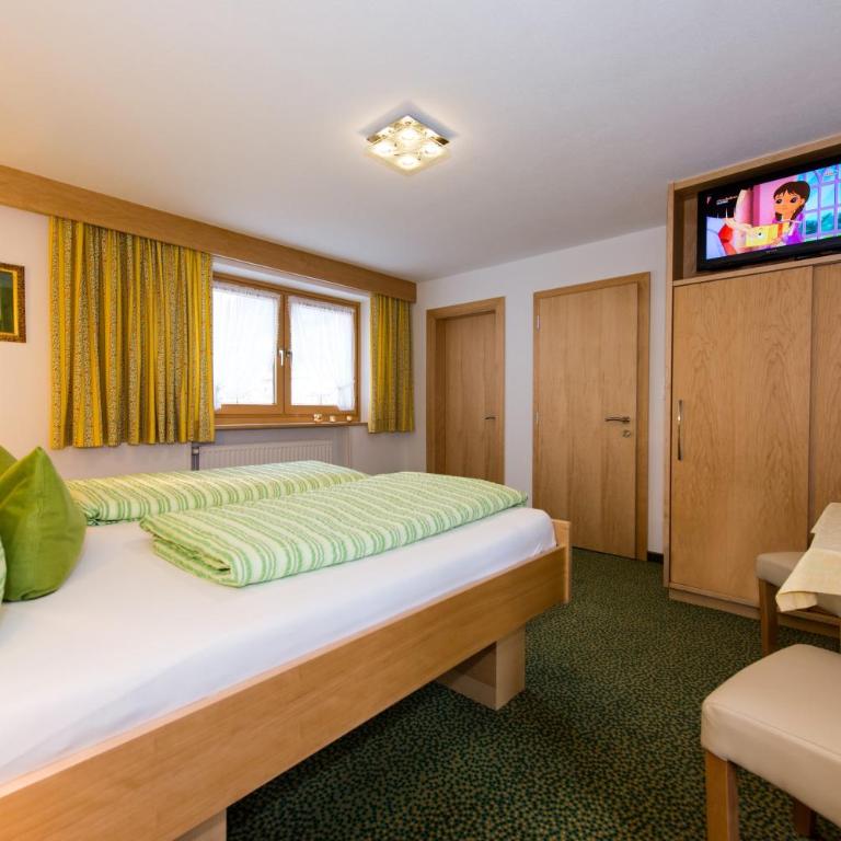 Gästehaus Wanker - Doppelzimmer mit Bergblick - 4