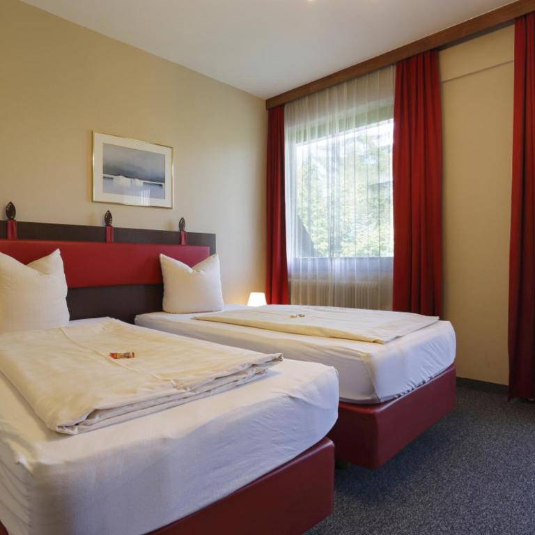 Alpen.Adria.Stadthotel - Doppelzimmer mit Balkon - 11