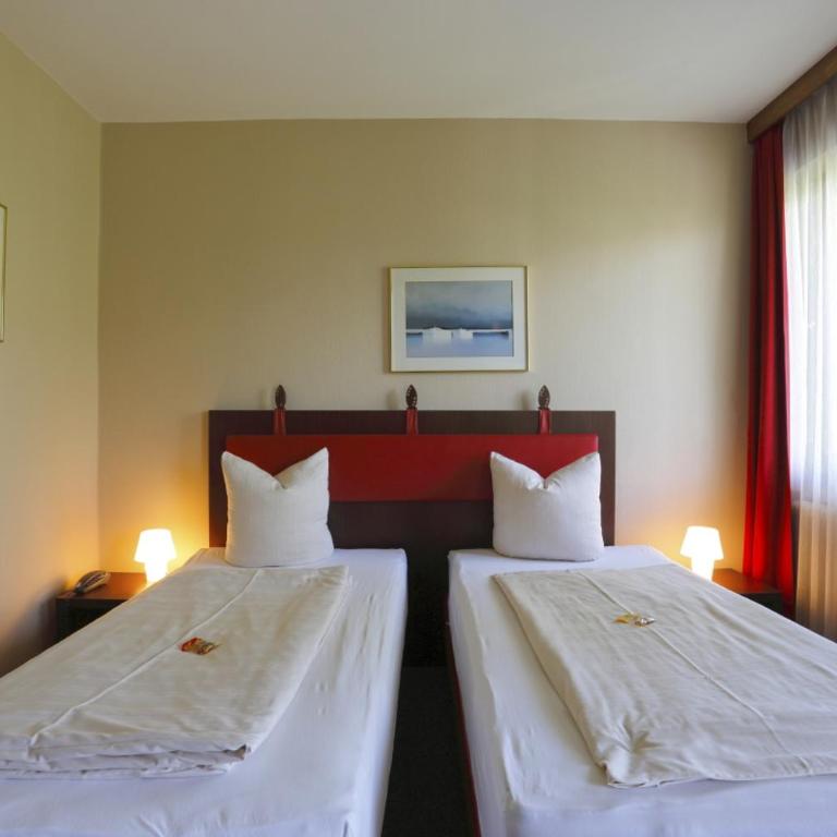 Alpen.Adria.Stadthotel - Doppelzimmer mit Balkon - 9