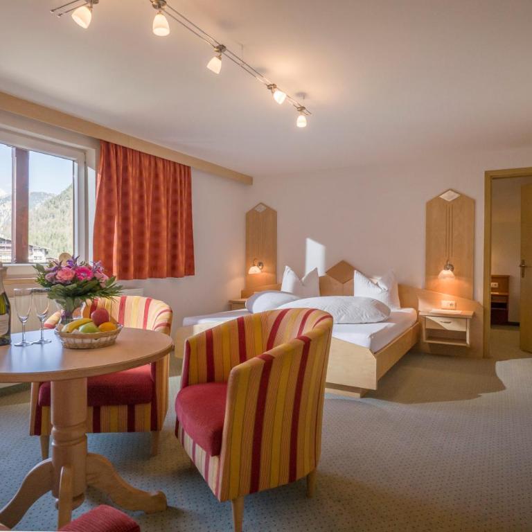 Hotel Enzian - Apartment mit Gartenblick - 6