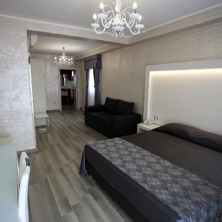 Hotel Paladini - Camera Tripla Luxury - 5