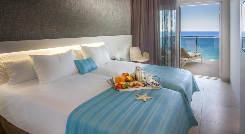 Suitopia - Sol y Mar Suites Hotel