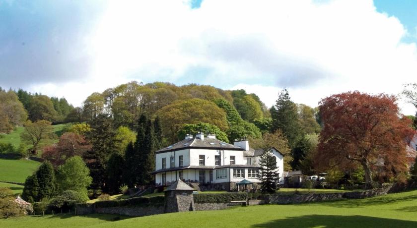 a large white house with trees, Ees Wyke Country House in Ambleside