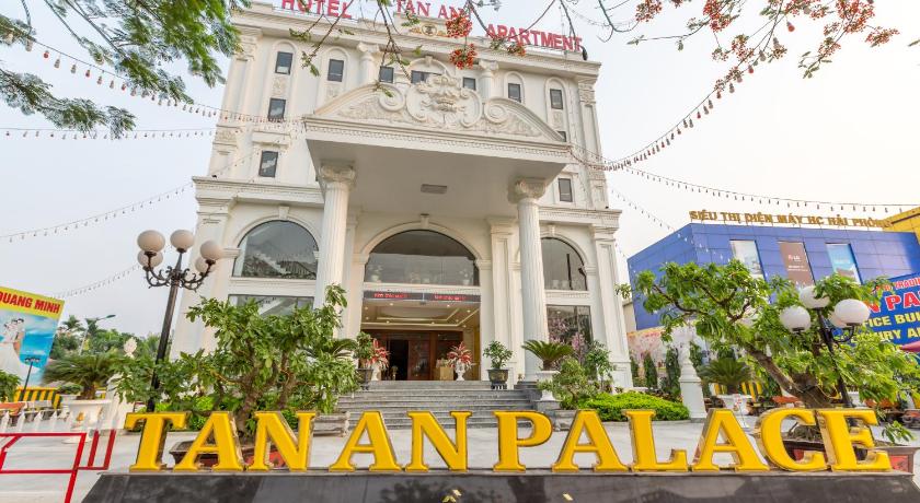 a large building with a sign on the front of it, Tan An Palace in Haiphong