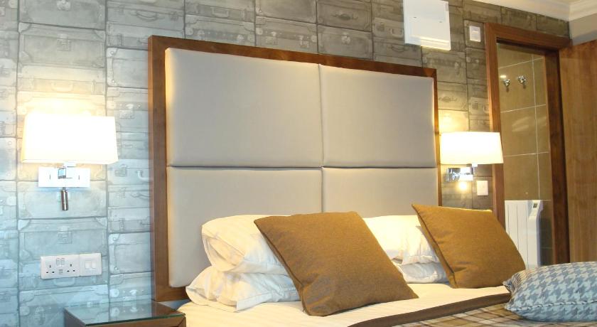Deluxe klases numurs, četrvietīgs (Deluxe Quadruple Room) attēls 6