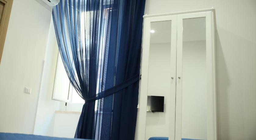 Image of Quadruple Room with Private Bathroom 4