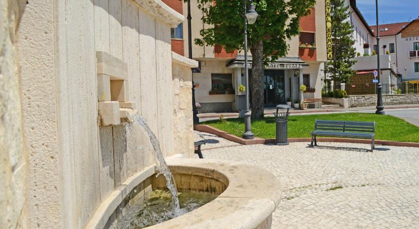 a stone wall with a fountain in front of it, Grand Hotel Europa in Rivisondoli