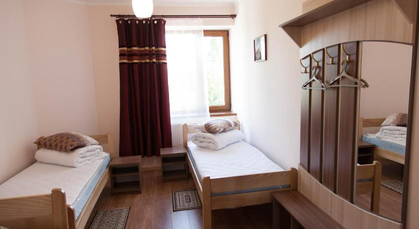 Foto, millel on kujutatud Peretuba privaatse vannitoaga (Family Room with Private Bathroom) 0